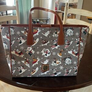 Dooney & Bourke Winter themed Disney Tote bag. Relatively big, can fit a laptop